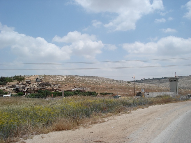 dco huwara checkpoint with surrounded palestinian farm 